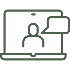 Laptop with user icon and chat bubble